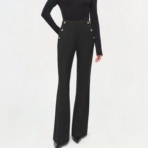 Black trouser with golden buttons